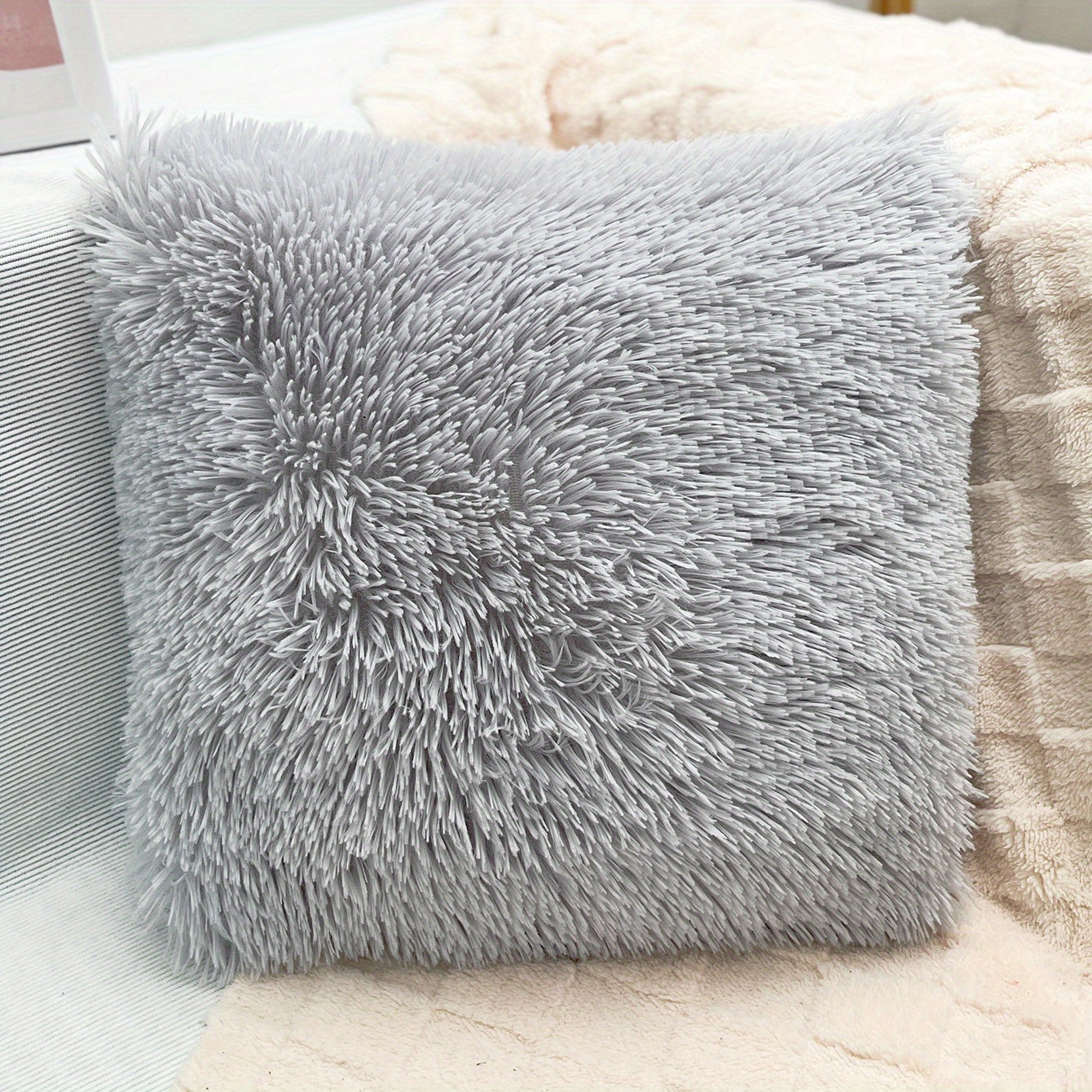 Bohemian-style plush throw pillow cover for sofa or bed in gray, white, and turquoise. Features zip closure, soft polyester material. Hand wash recommended.