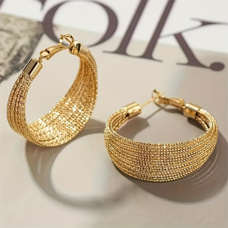 Elegant multi-layer geometric alloy hoop earrings with golden clasp. Perfect for daily wear and special events, suitable as a gift for friends. Geometric design complemented by a fabric