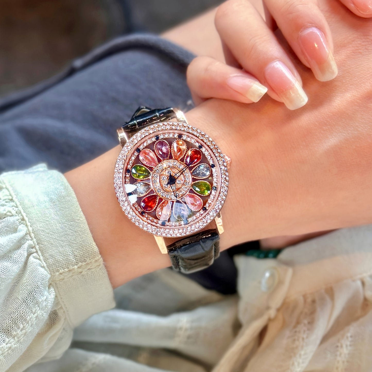 Stylish women's quartz wristwatch with colorful rhinestones, rotating dial, alloy case, and PU leather strap. Perfect for date night and everyday wear.