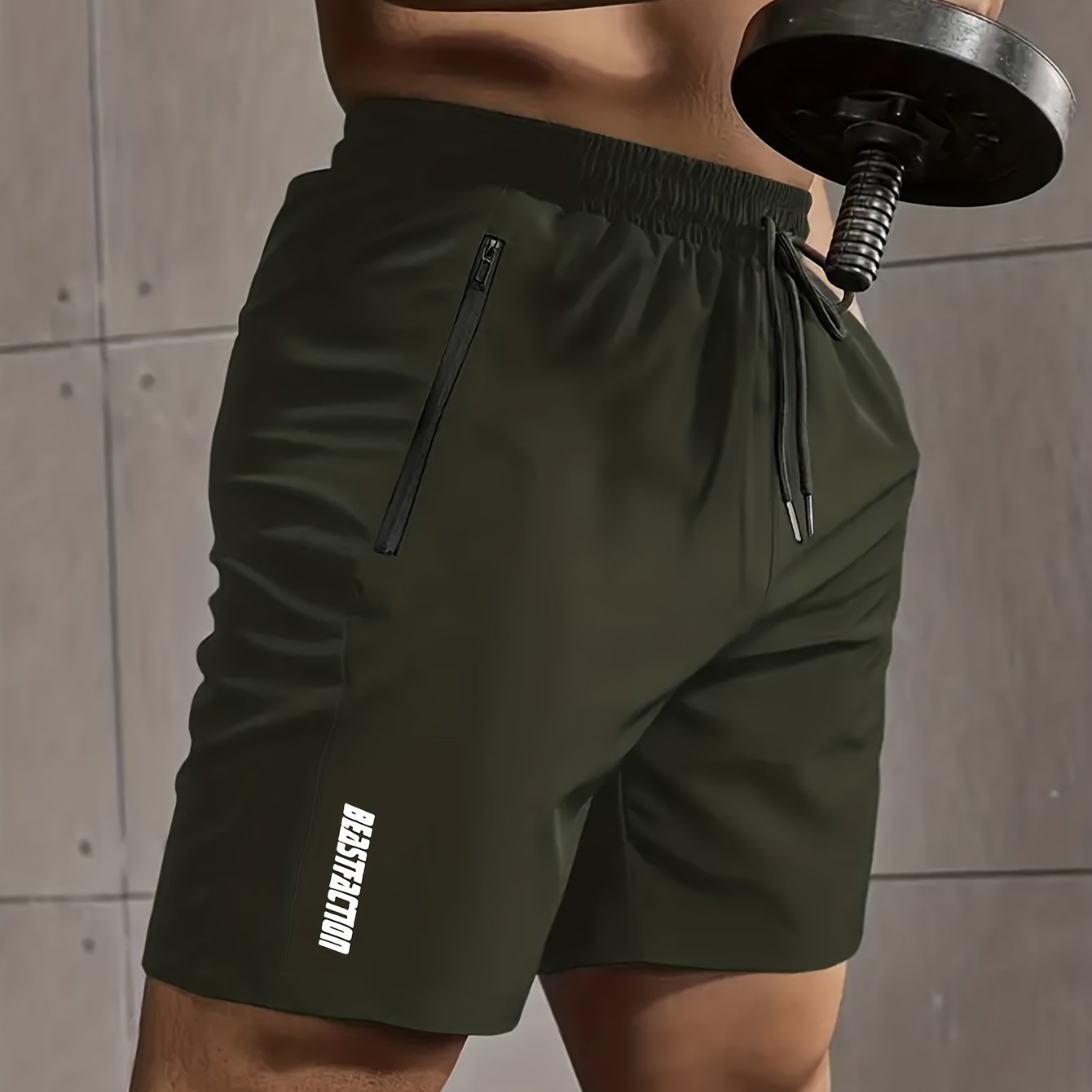 Solid men's shorts with zipper pockets, elastic waist drawstring for summer fitness.