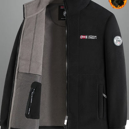 Men's fleece-lined jacket with embroidered detailing in black and gray, featuring a stand collar, zip-up closure, side pockets, and shaggy fleece fabric.