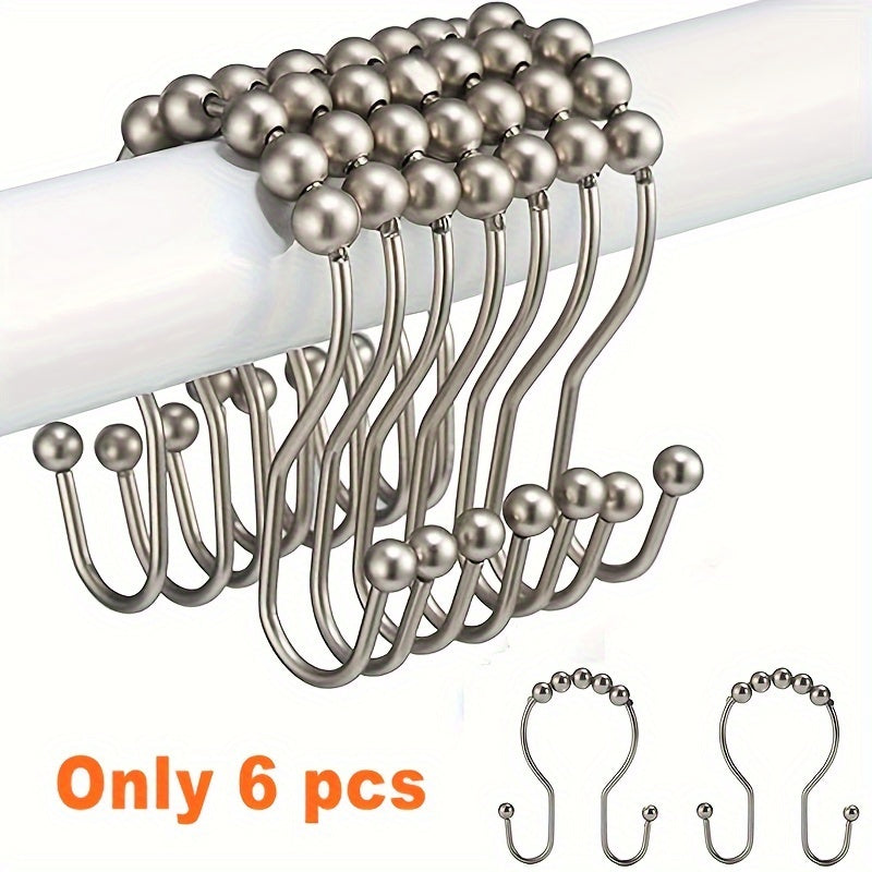 Set of 6 stainless steel shower hooks with double glide design for easy opening and closing, compatible with most rods and liners.