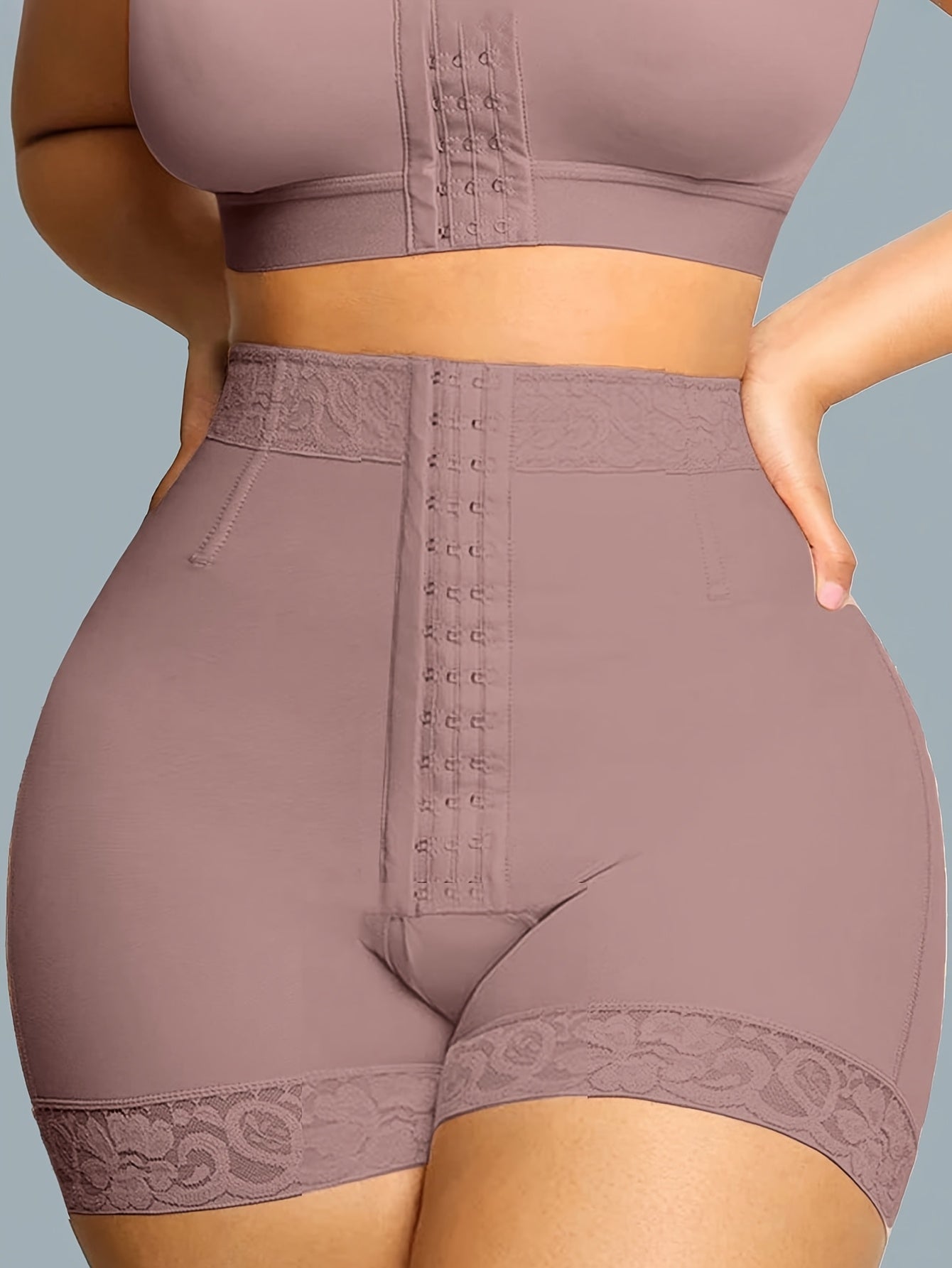 Joshine high-waisted shapewear shorts for women in beige with tummy control, butt lifter, and slimming body shaping features. Made from a nylon/elastane blend with lace detail. Hand