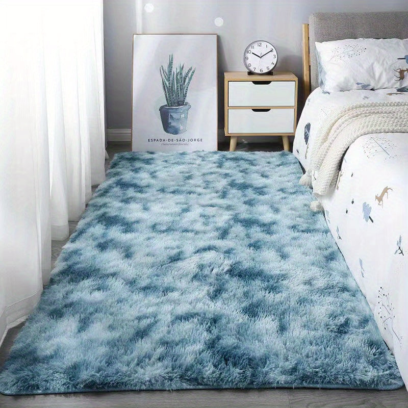 Soft, fluffy shag area rug perfect for living room or bedroom decor. This non-slip machine washable carpet adds luxury and coziness to any space.