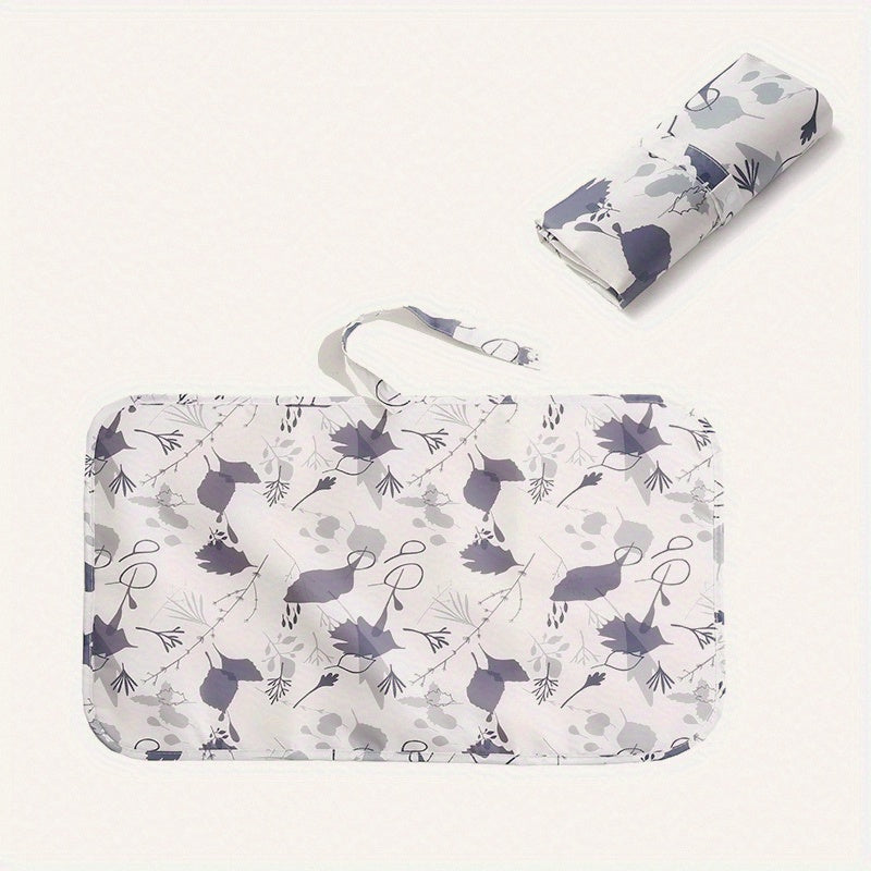 Lightweight and waterproof, this foldable diaper changing pad is perfect for traveling with your little one. Stay prepared for on-the-go diaper changes with this portable and compact changing mat.