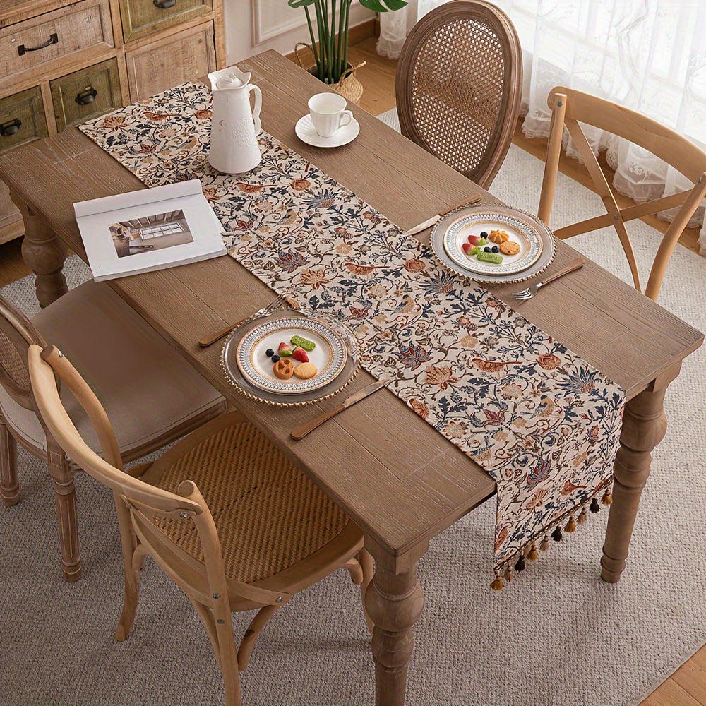 Vintage floral and bird jacquard table runner with tassels in rustic countryside style. Made of polyester, 33cm wide. Ideal for dining, coffee, and tea tables. Vintage design with polyester fabric.