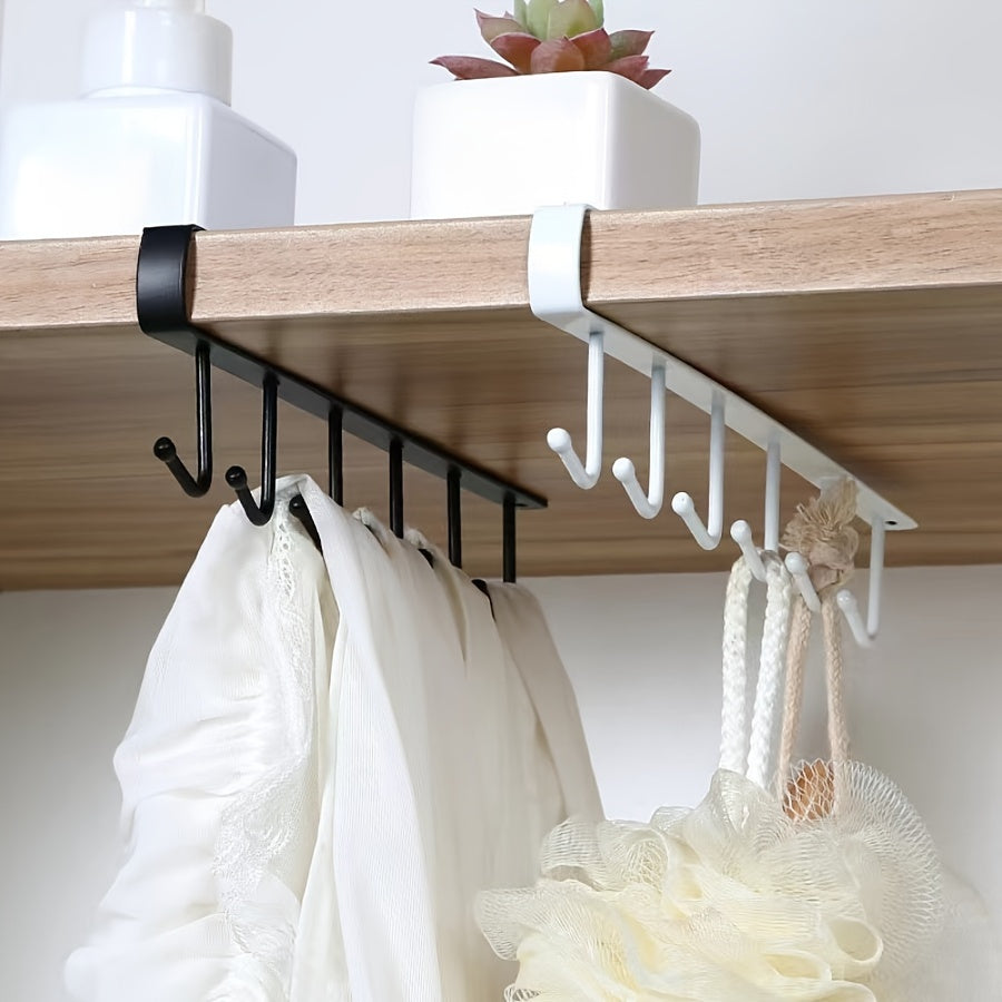 Double row hanging hook cup rack made of cast iron for kitchen cabinet storage without the need for drilling, electricity, or powered usage.