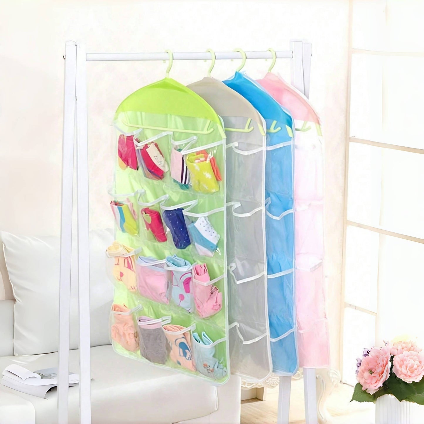 Vibrant 16-pocket hanging organizer for socks, underwear, and small items made of durable polyester with mesh pockets, perfect for bedroom or living room.