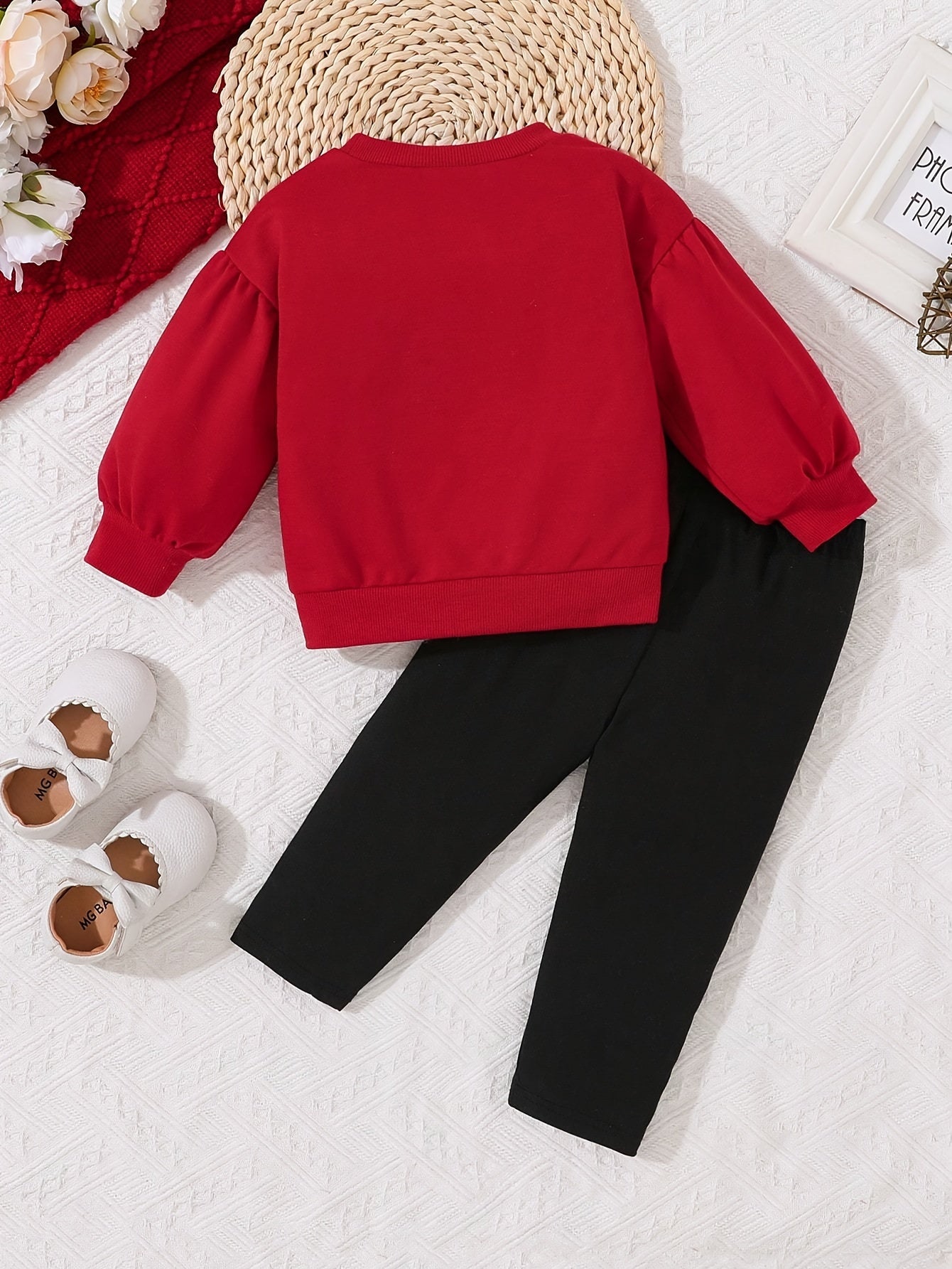 Cozy knit sweatshirt and heart print pants set for girls, machine washable and ideal for fall/winter outdoor activities.