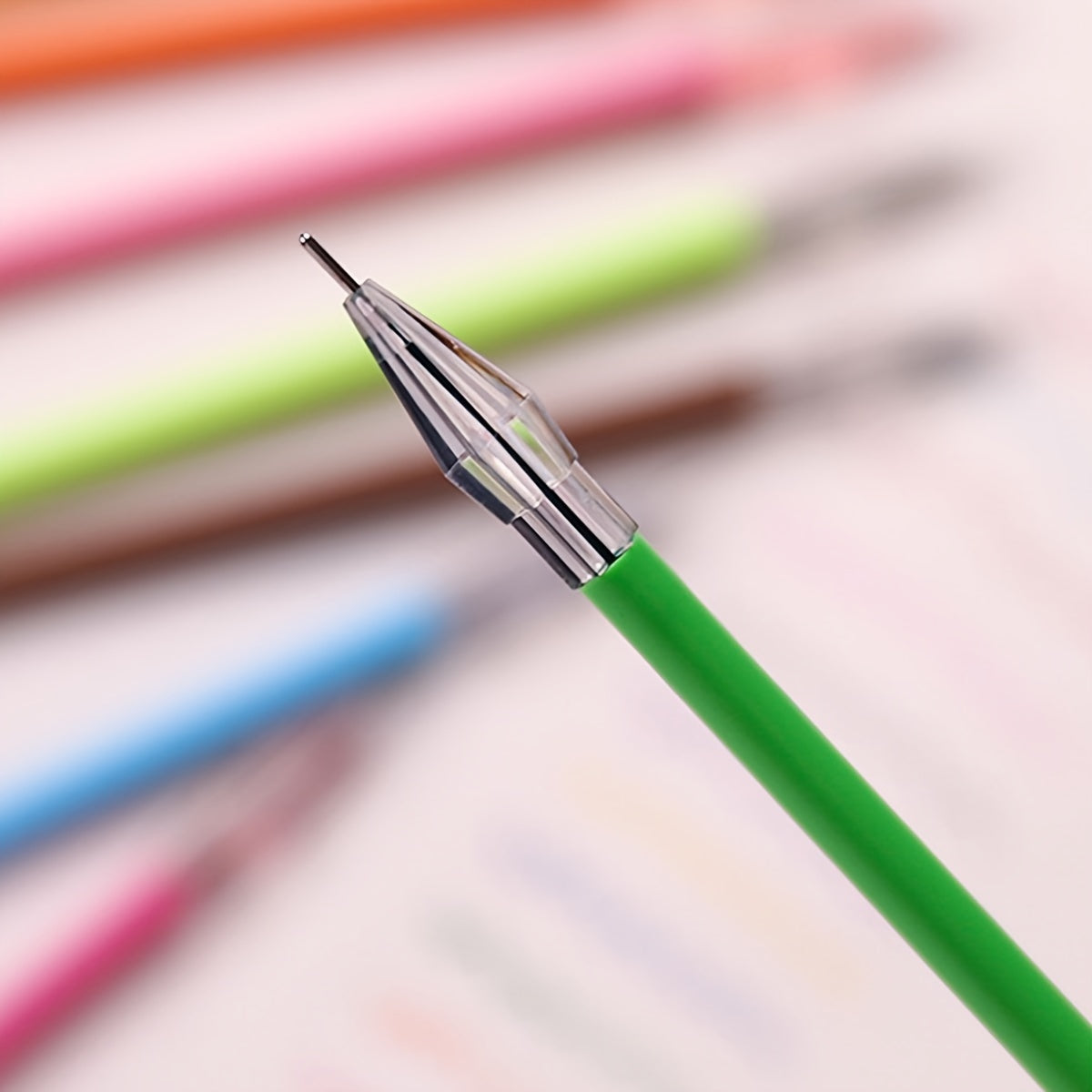 Set of 12 candy-colored 0.5mm refills for note-taking.