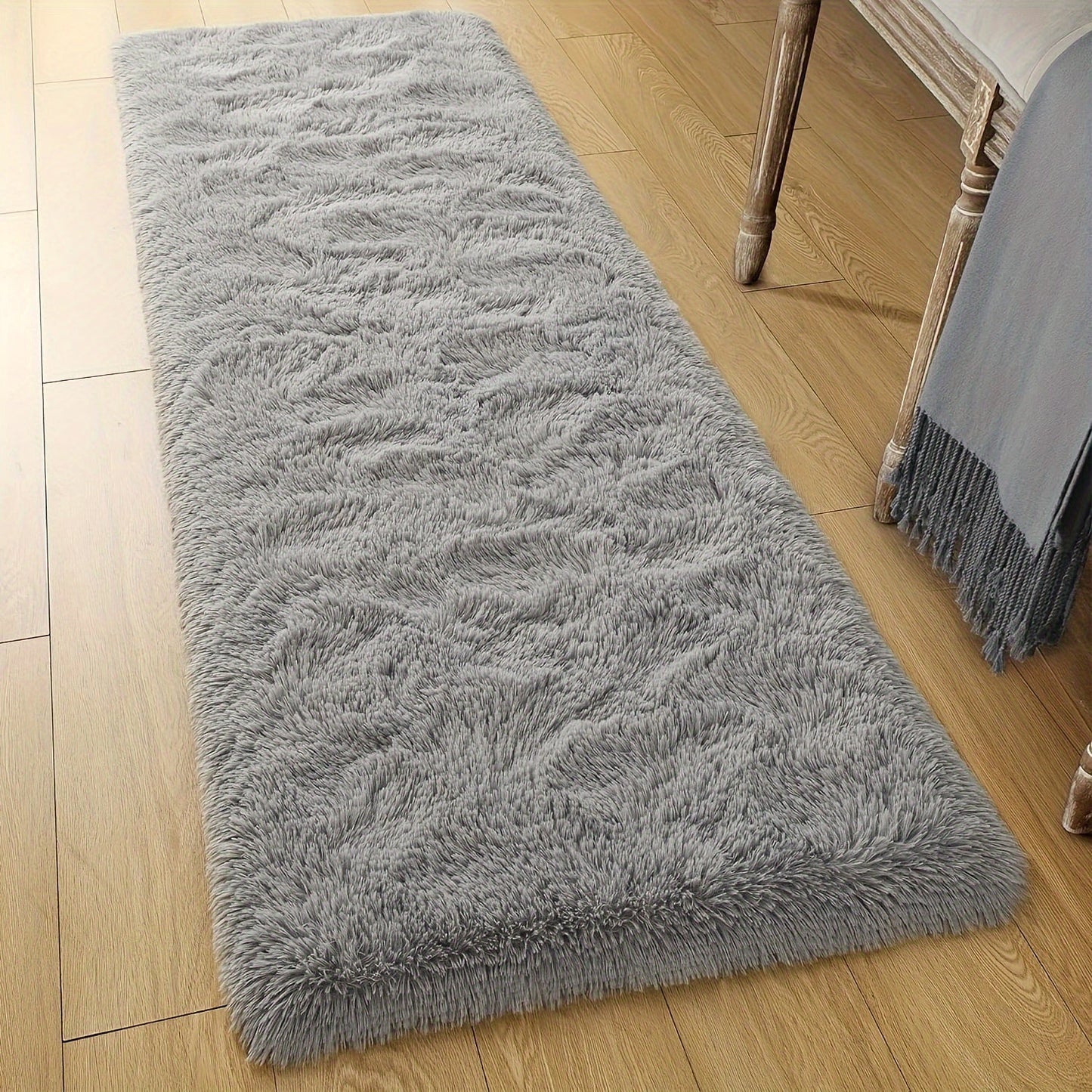 The Soft and Cozy Shaggy Carpet is ideal for the living room, bedroom, and hallway. It comes in a variety of colors and is simple to maintain with dry cleaning. With its rectangular shape, it can be used in multiple areas of the home. Constructed from