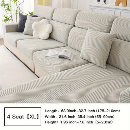 Waterproof sofa cover with elastic stretch and jacquard argyle pattern for home or office decor.