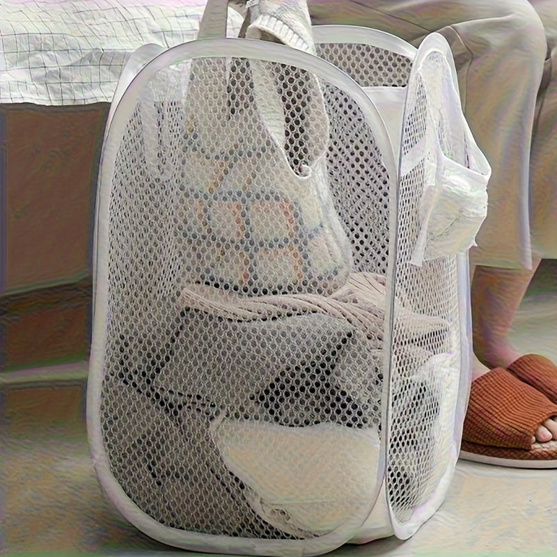 New design Pop-Up Laundry Hamper features convenient handles and a high storage capacity. This foldable polyester mesh basket is perfect for storing clothes in any room of the house. Liner not included. Made with durable polyester fabric and versatile