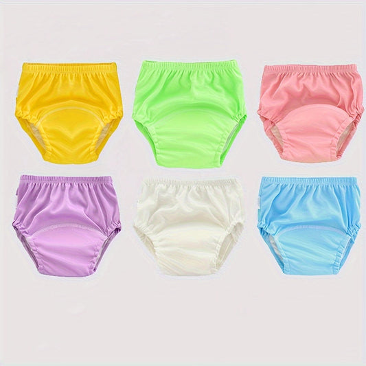 Three pieces of soft and breathable potty training pants for young children. These washable pants come in mixed colors and are made of polyester knit fabric. Perfect for youngsters learning to use the potty, these short pants are comfortable and easy to