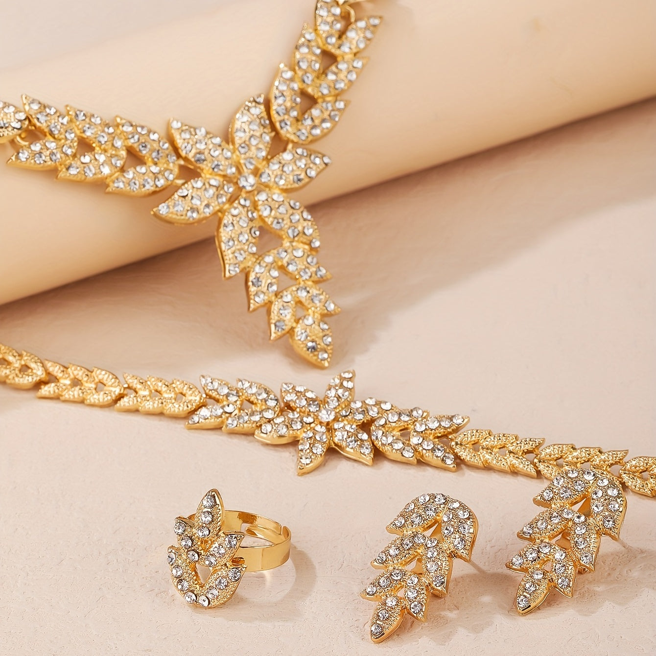 Beautiful Wedding Jewelry Set for Women: Gold Leaf Rhinestone Necklace, Ring, Earrings, and Bracelet - Perfect Gifts for Eid