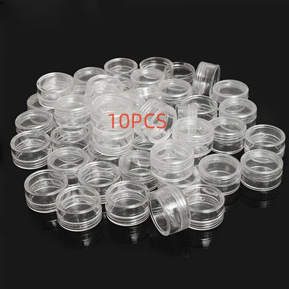 10 clear round plastic containers with secure lids are ideal for storing nail art, glitter, and cosmetic samples. They are lightweight and portable, perfect for bathroom and makeup organization. Ideal for nail care products.