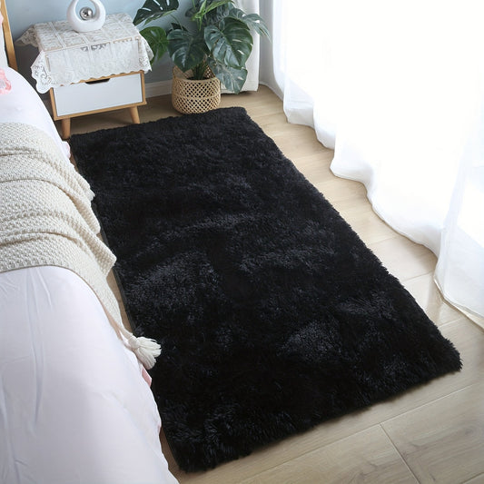 One piece of a shaggy rug, a fluffy floor mat, a simple plush area rug, a round soft area rug mat, a comfortable household carpet, perfect for your living room.