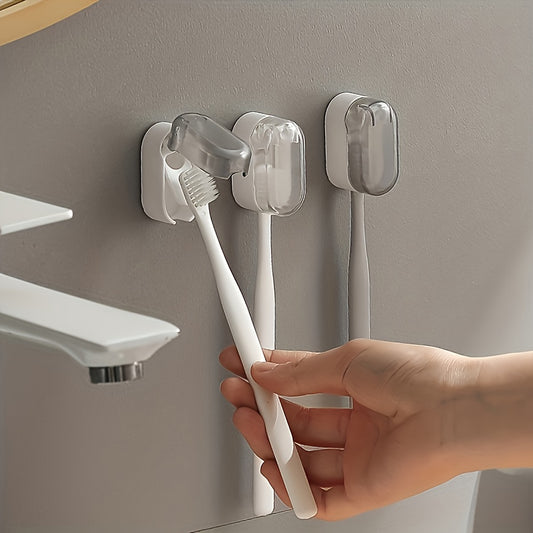 Wall-mounted toothbrush holder with cover, suitable for bathroom storage and decoration.