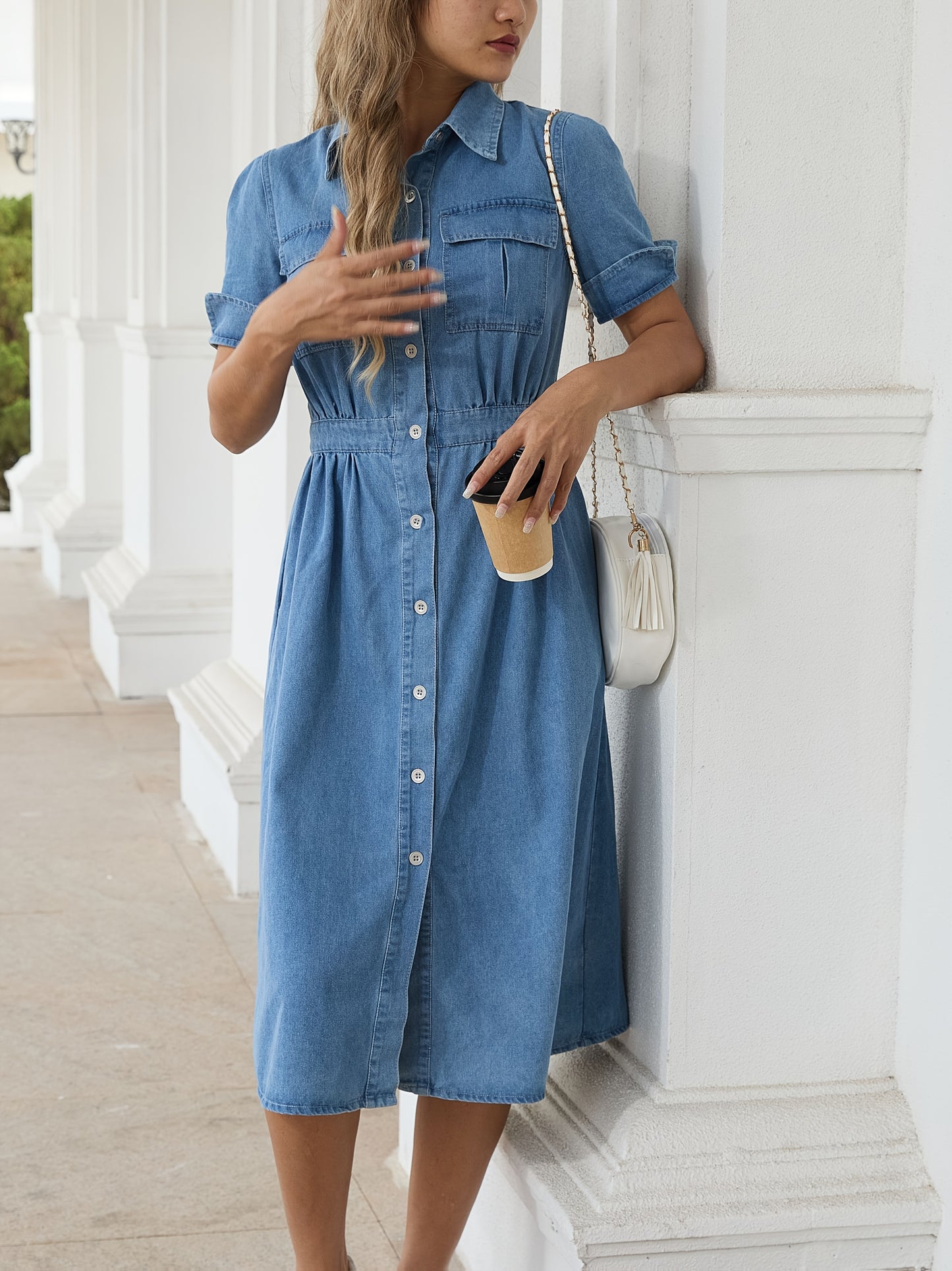 Casual denim midi dress for women, short sleeves, flap pockets, button-up front, non-stretch fabric, machine washable, elegant blue jean style.