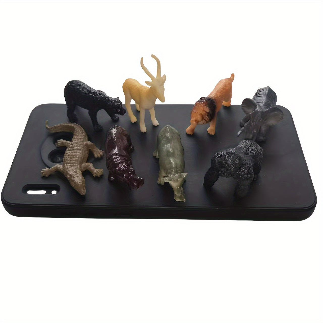 Wildlife Animal Figurines Set includes 12 pieces such as Lion, Tiger, Crocodile, Giraffe, Zebra, Elephant, and more. Suitable for ages 3+.