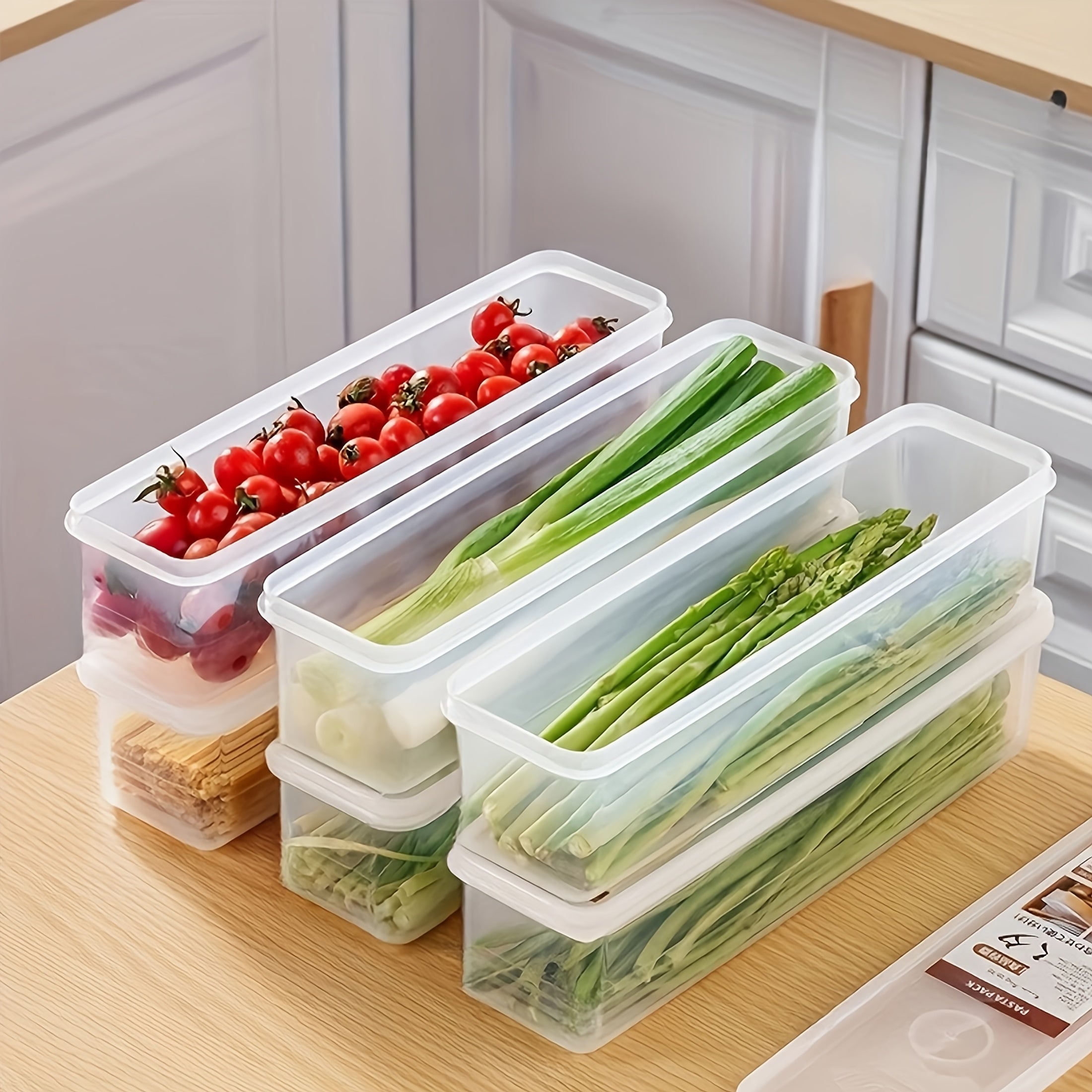 Set of 4 rectangular food storage containers with lids, made of reusable plastic for organizing onions, parsley, cilantro, garlic, pasta, and eggs in the refrigerator. These kitchen essentials are perfect for hand washing and organizing your pantry.