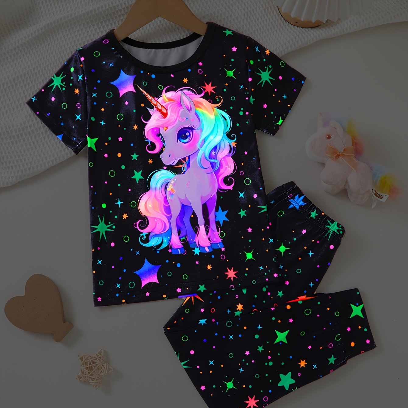 Girls' 2-piece set with cute unicorn hoodie and starry sky pants, perfect for outdoor wear with UV light illumination.