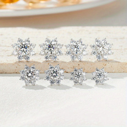 These Sunflower Moissanite Stud Earrings come in sizes of 0.5/1/2/3 Carat with a charming Flower Shape Simple Design. Crafted from 925 Silvery, these earrings make a perfect Valentine's Day Gift and come in a Box. Available in Multiple Sizes, weighing