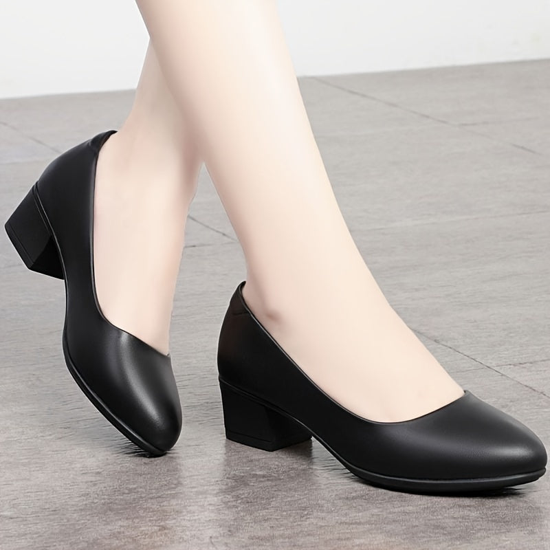 Stylish black pumps with medium heel, great for work and daily wear, comfortable for long periods, ideal for women and mothers.