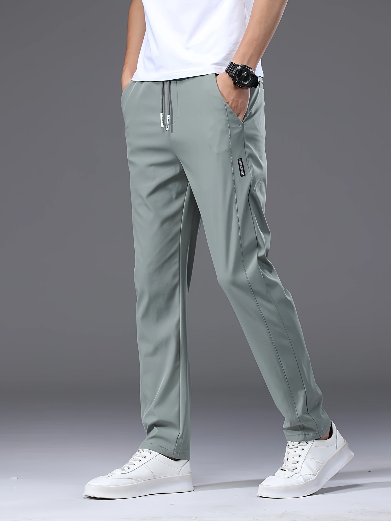 Men's slim fit drawstring sports pants, lightweight quick-dry trousers for summer leisure wear.