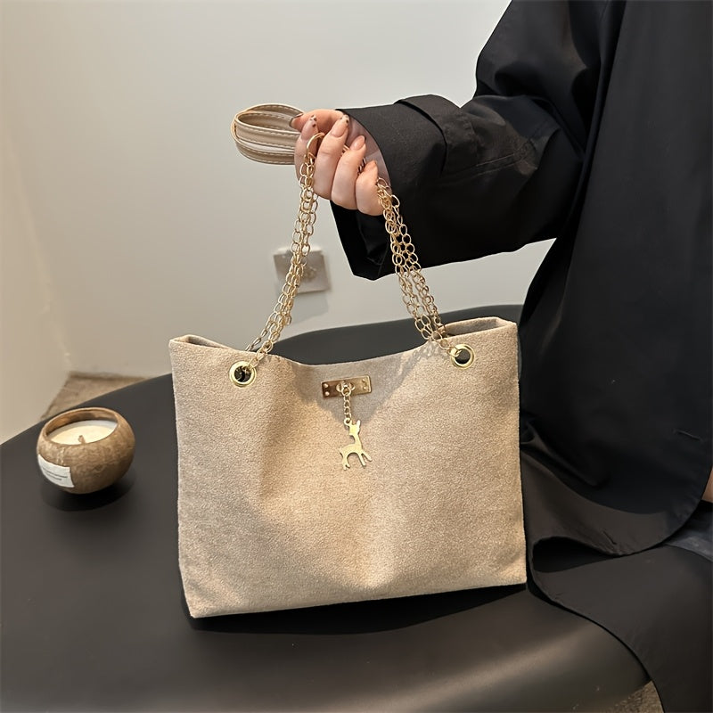 Casual faux leather tote bag with deer charm, lightweight, large capacity, simple design, fixed straps, magnetic closure, polyester lined.