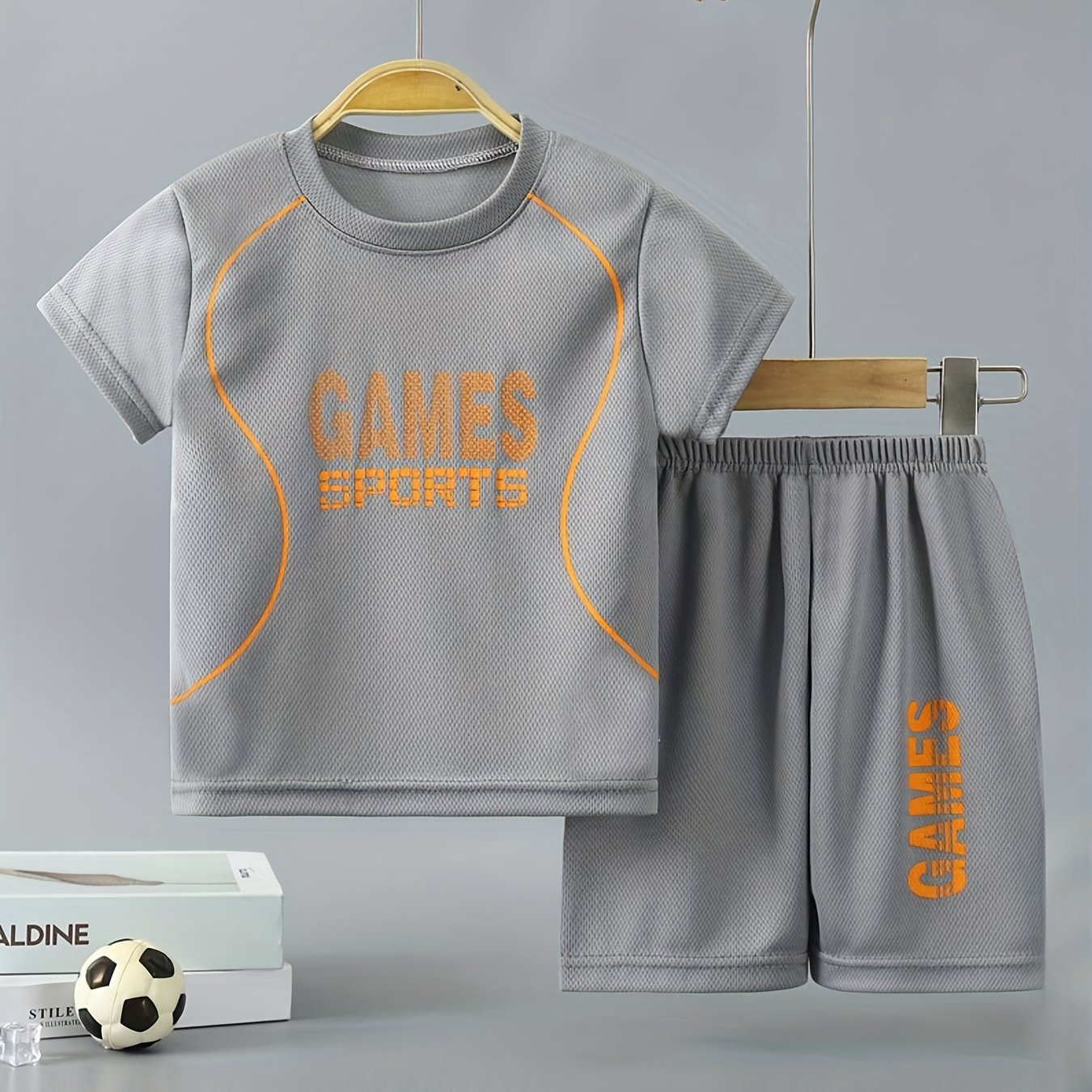 Boys' 2pc quick-drying outfit with GAMES SPORTS print t-shirt and shorts for summer outdoor wear.