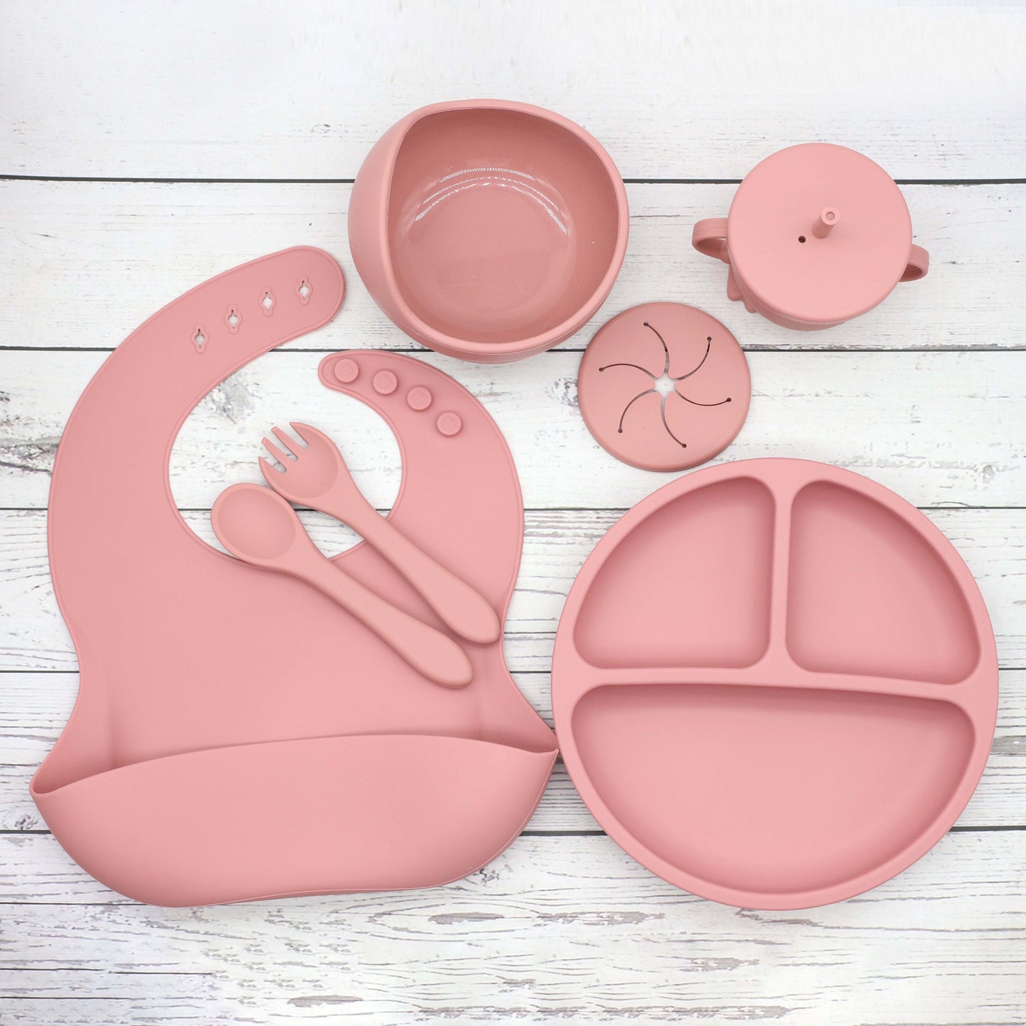 6 piece set of Silicone Feeding Items, featuring a Silicone Bib, Silicone Suction Plate, Silicone Suction Bowl, 2-in-1 Drinking Training Cup. Made of soft and safe, food-grade silicone that is BPA-free. Perfect Easter gift idea.