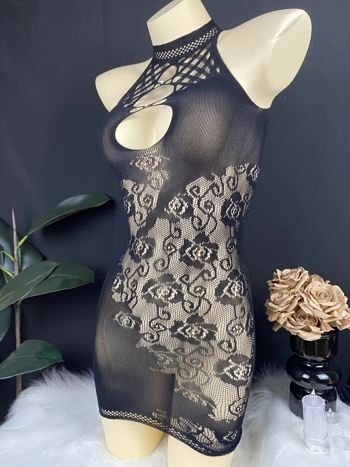 Black halter neck lace bodycon dress with hollow-out detail in nylon knit, perfect for a sultry nightclub look.