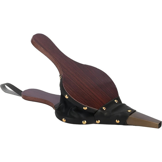 Traditional fireplace bellows tool made from handcrafted wooden corrugated pipe adorned with black faux leather and brass rivets, designed for efficient airflow in wood stoves, fire pits, and camping. Perfect addition to your fireplace accessories.