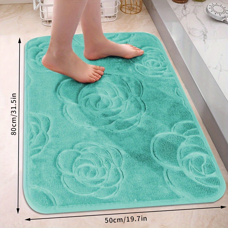 Soft and luxurious bath mat featuring a beautiful rose embossed design. This non-slip bathroom rug is made of ultra-soft knit polyester, providing superior comfort and absorbency. Lightweight and washable, this versatile mat is perfect for use in the