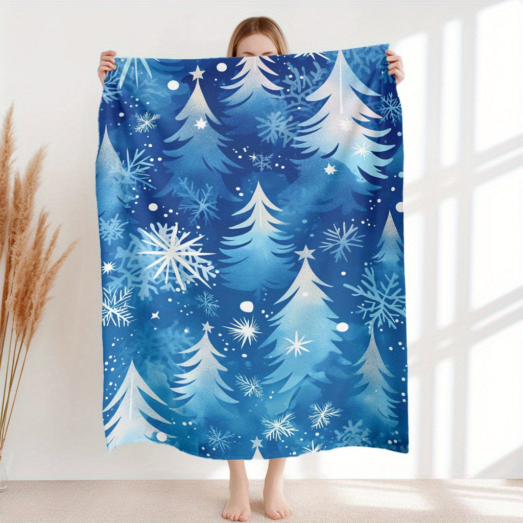 This modern blue snowflake and pine tree pattern flannel blanket is perfect for winter dreams. It's lightweight, plush, and comfortable, making it ideal for snuggling up on the sofa or taking a nap at the office. This versatile blanket is also great for