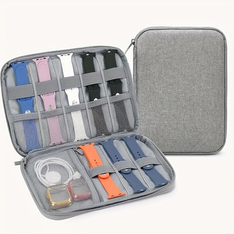 Waterproof digital storage box for travel, organizes various electronic devices and accessories.