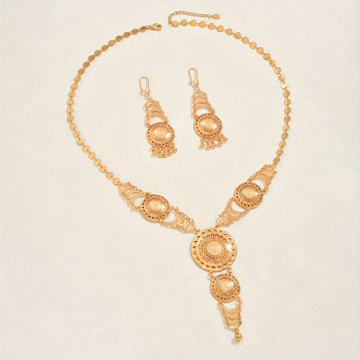 Retro Ramadan inspired copper gold plated necklace and earrings set featuring a creative sun flower design and tassel detail. Perfect for adding an elegant touch to women's party and wedding attire.