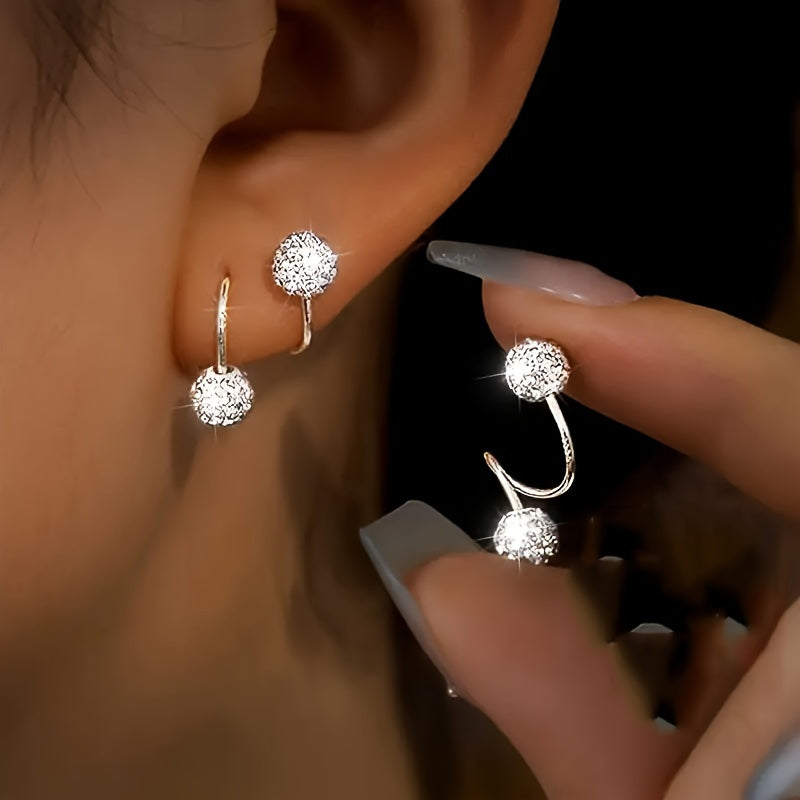 Luxury spiral rod ball earrings made of stainless steel and 925 silver with rhinestone inlay, perfect for daily wear or as a gift.