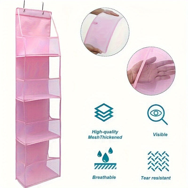 A fabric organizer in pink, designed to be mounted on a door and featuring four pockets. This versatile storage rack can be used in wardrobes, bathrooms, bedrooms, or dormitories. It includes a transparent window and a reinforced rack, along with two