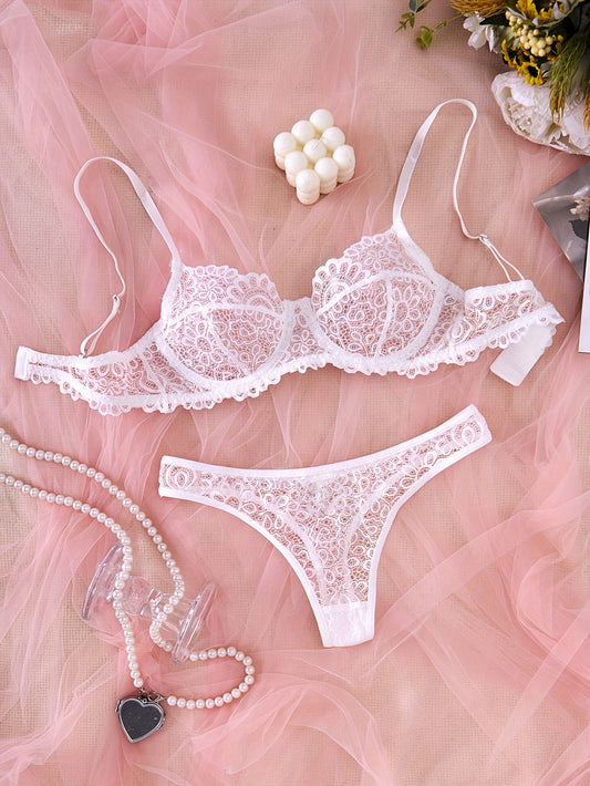 Lace bra and panty set with mesh details, revealing yet comfortable design.