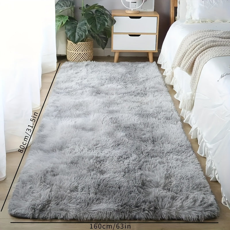 Transform your living room or bedroom with this Super Soft Shag Area Rug! Made of stain resistant and lightweight washable polyester, this indoor rug in solid gray is the perfect addition to your room decor and holiday celebrations. Get 1PC now and