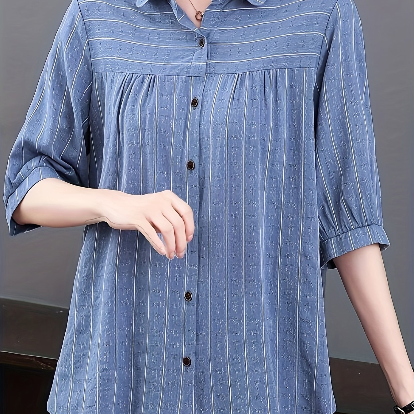 Striped print half sleeve shirt for women, perfect for spring and summer.