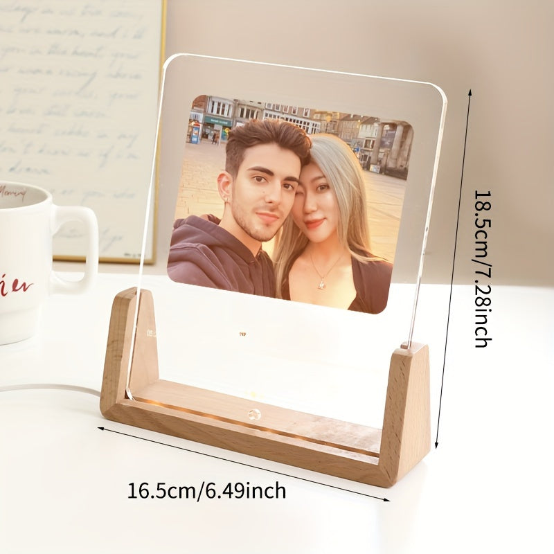 This personalized photo frame features a modern acrylic design with an LED love heart, creating a romantic atmosphere. It is USB powered and suitable for displaying a single picture on your desktop. This frame makes a creative and thoughtful birthday