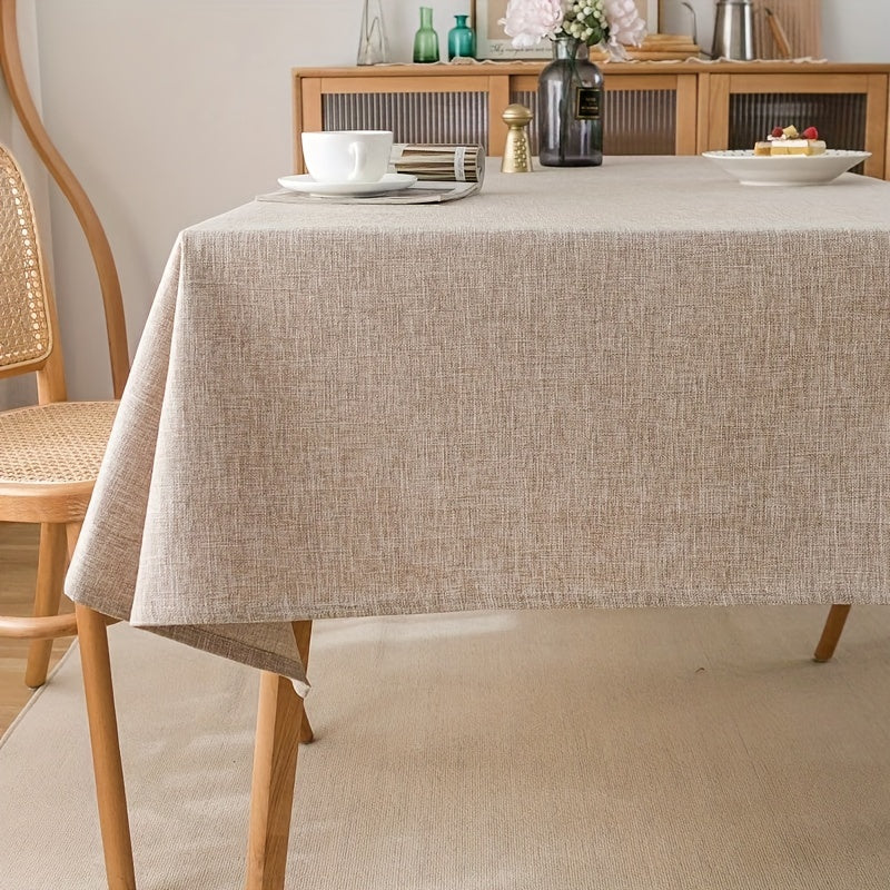 Beige rectangular polyester tablecloth for picnics or holiday gatherings with simple style, ideal for home dining decor.