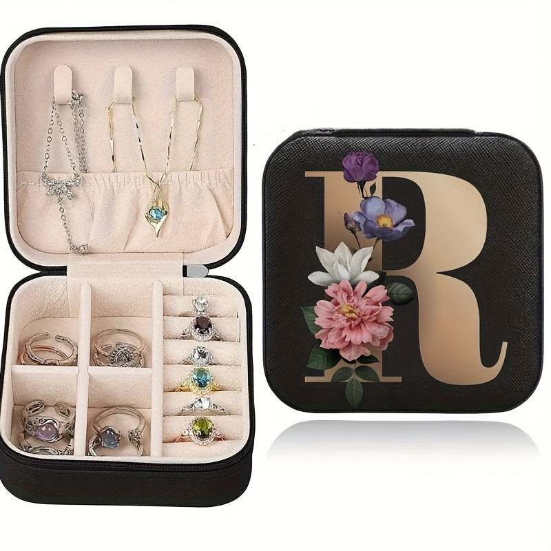 Floral initial jewelry organizer box with compact design, soft velvet lining, durable zipper, and lightweight, ideal for jewelry organization and travel.