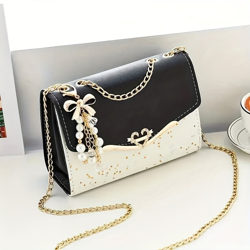 Stylish polka dot PU crossbody bag with tassel charm, magnetic closure, metal chain strap. Ideal for shopping, office, travel. Perfect gift for her.