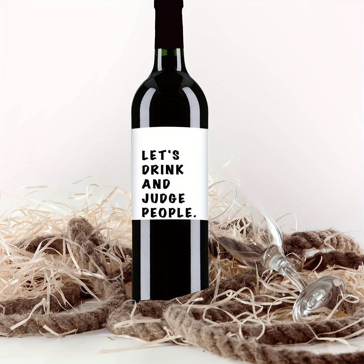 4 funny wine bottle labels with "Let's Drink and Judge People" quote, perfect for parties and as a gift for wine enthusiasts.