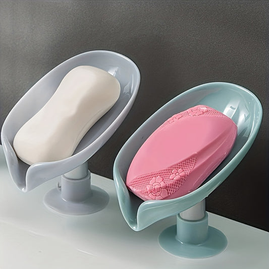 Leaf-shaped soap holder with drain, strong suction, easy installation, enhances decor, keeps soap dry.