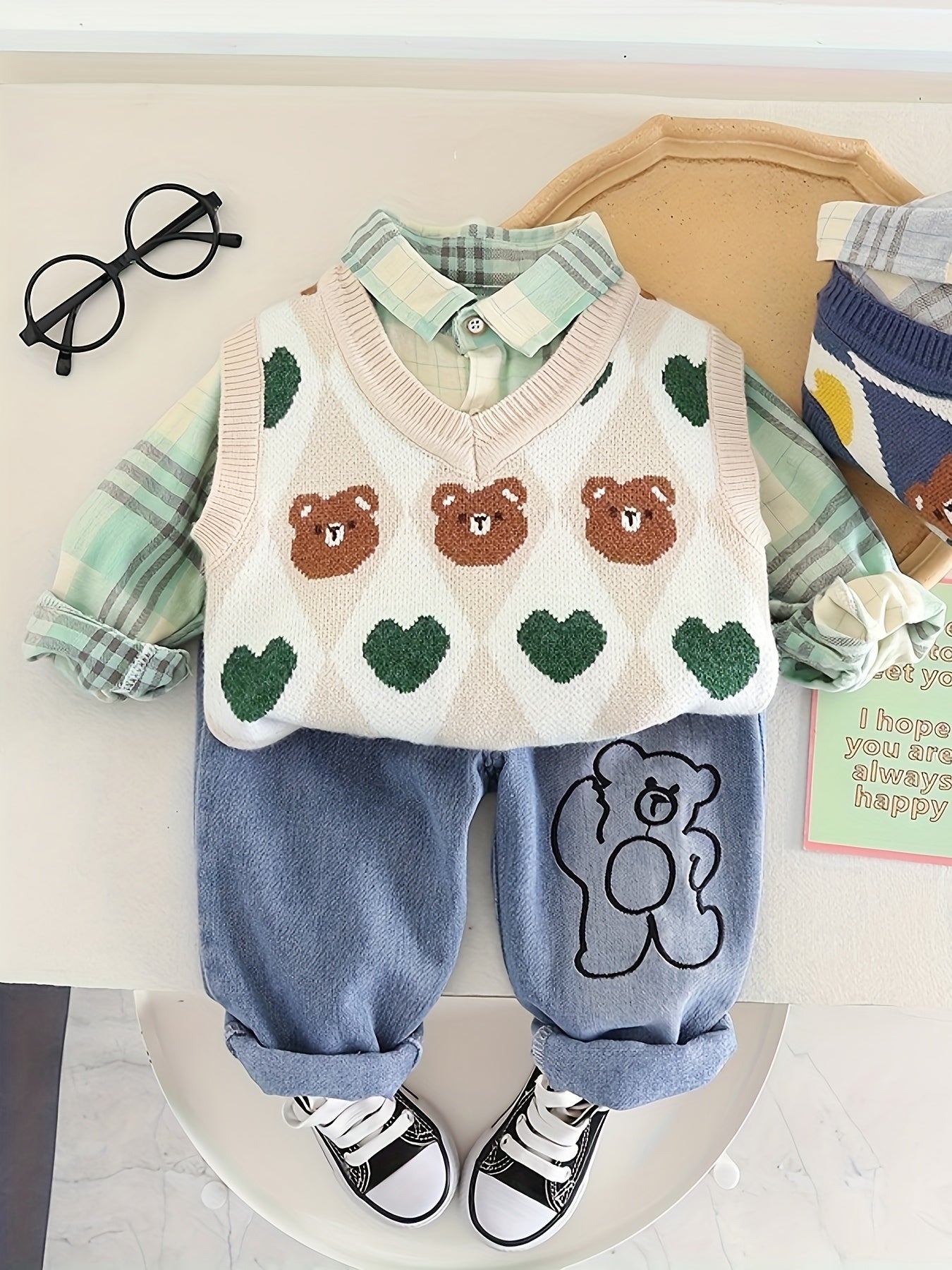 Boys' three-piece set with knit vest and jeans